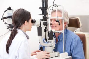 doctor testing for glaucoma during eye exam