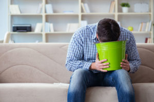 82687552 - man suffering from sick stomach and vomiting