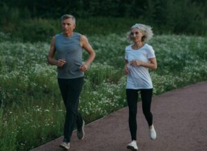senior couple running exercising.