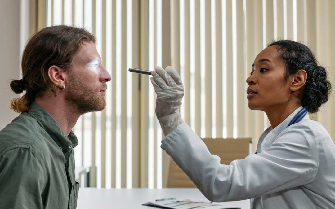 doctor performing an eye exam