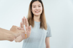 No smoking. Woman stop smoke, refuse, reject, break take cigarette, say no. quit smoking for health. world tobacco day. drugs, Lung Cancer, emphysema , Pulmonary disease, narcotic, nicotine effect